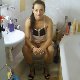 An Italian girl grunts and sighs sitting on a toilet and shitting. Pooping sounds, plops and farts can be heard. An earlier clip by Angie Joy. Presented in 720P HD. Over 6 minutes.